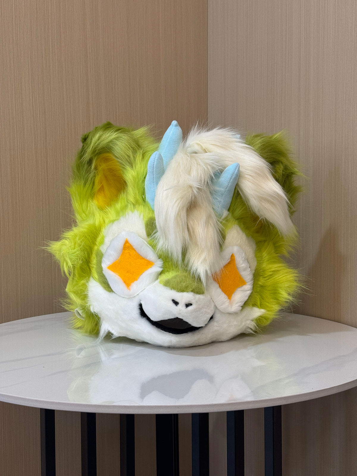 Alternate angle of the lime green and cream kemono fursuit head