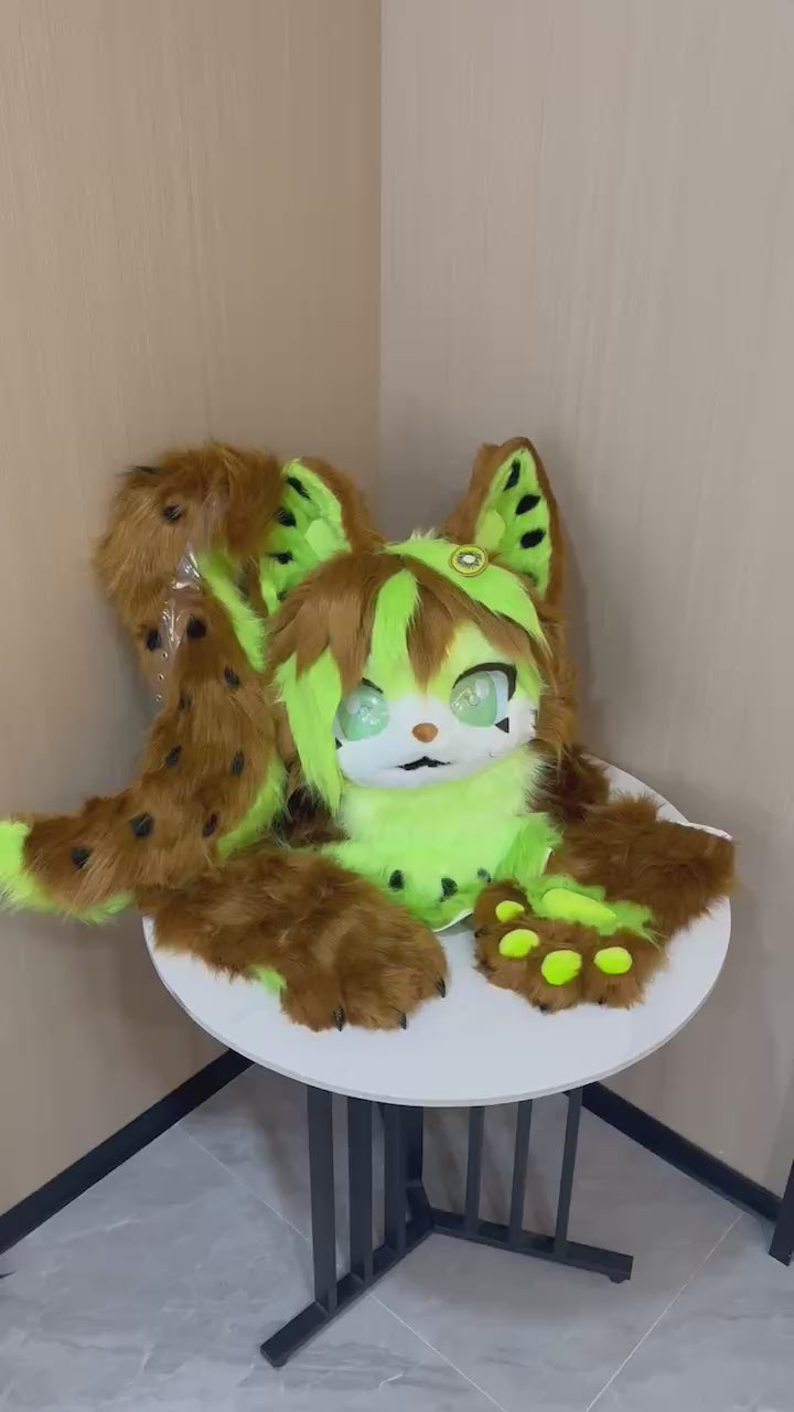 Brown and lime leopard cat fursuit head and paw detail — video