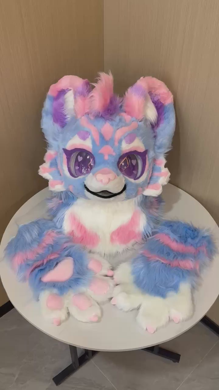 Pastel blue and pink kemono cat fursuit head and arm paws — video