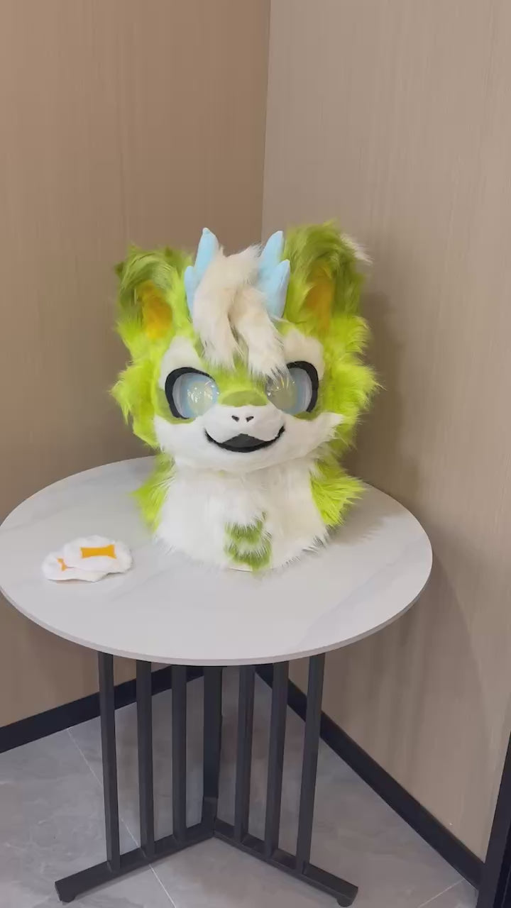 Lime green feline fursuit head with blue horns — finished build video